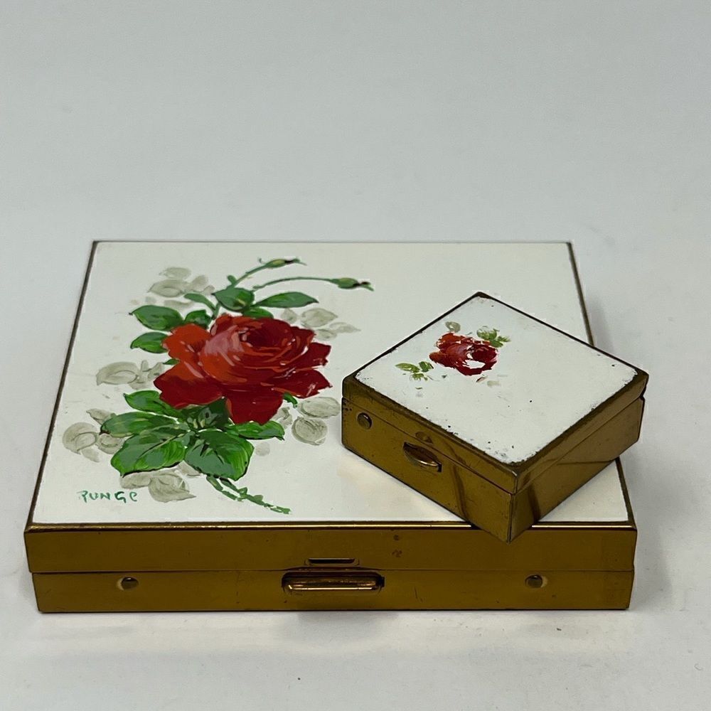 Vintage hand painted cigarette holder and small matching pill box.